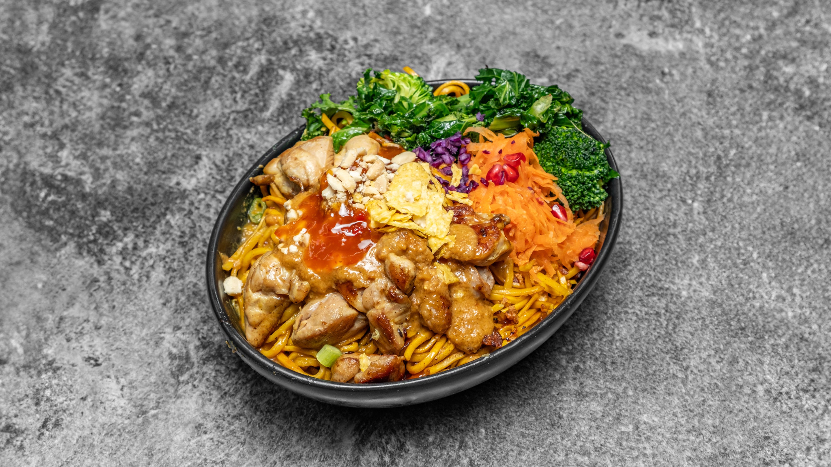 Satay chicken with pineapple and peanuts fried noodles with stir-fry Vegetables