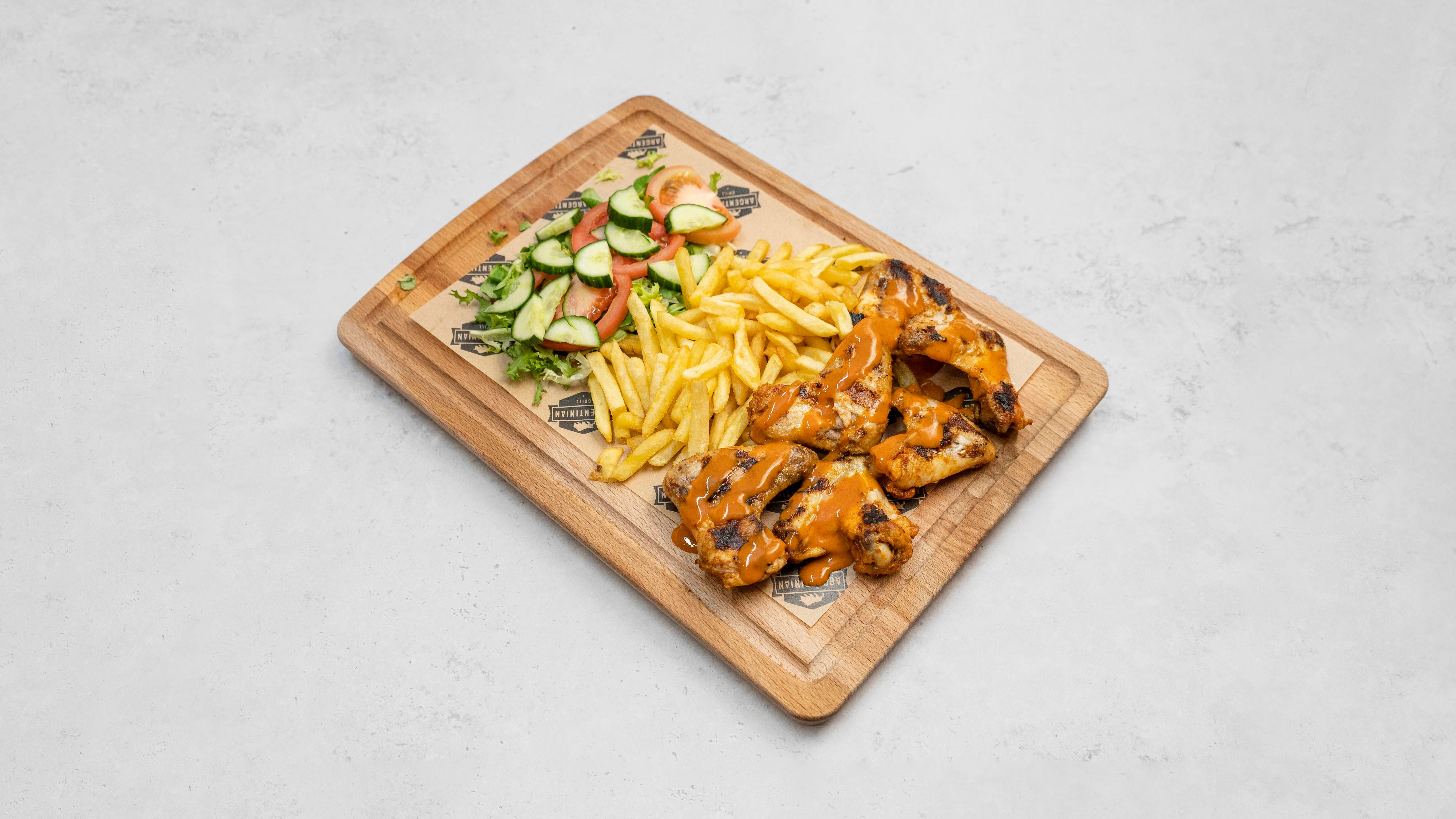 Chicken Wings with salad & Fries or Rice