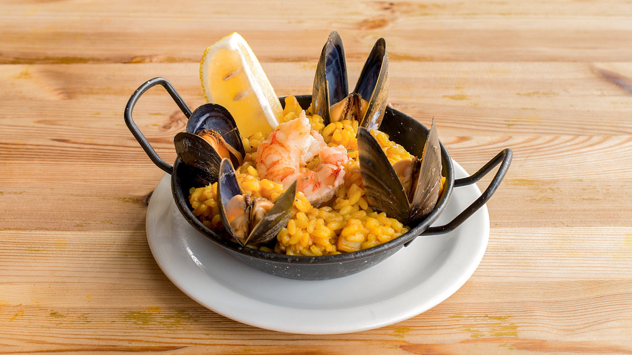 House Paella & Bottle of house wine