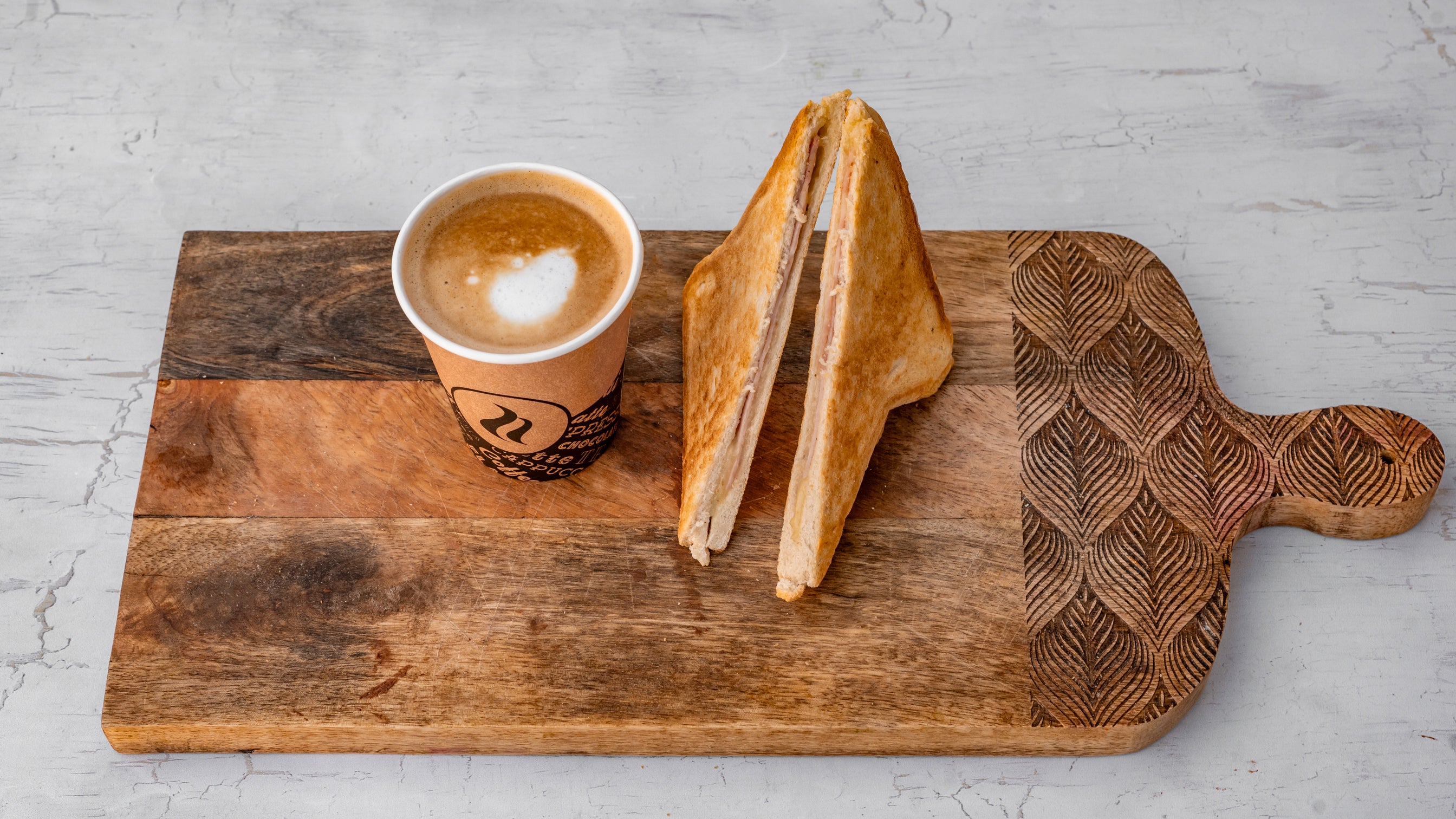 Any Coffee with Cheese and Toast or with Ham and Cheese Toast