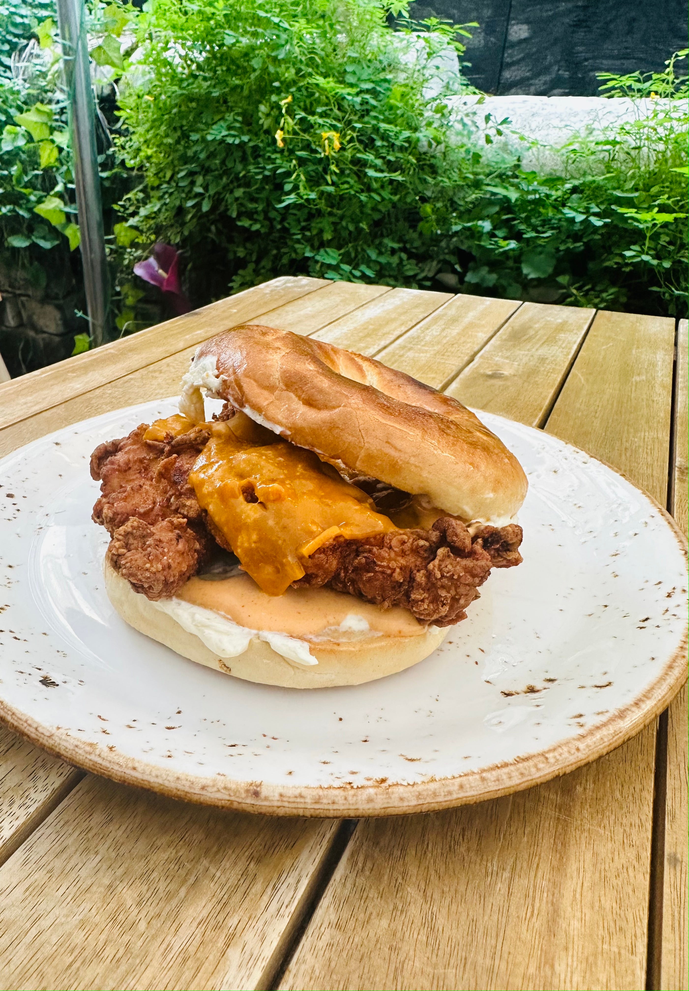 Fried chicken and cheese bagel
