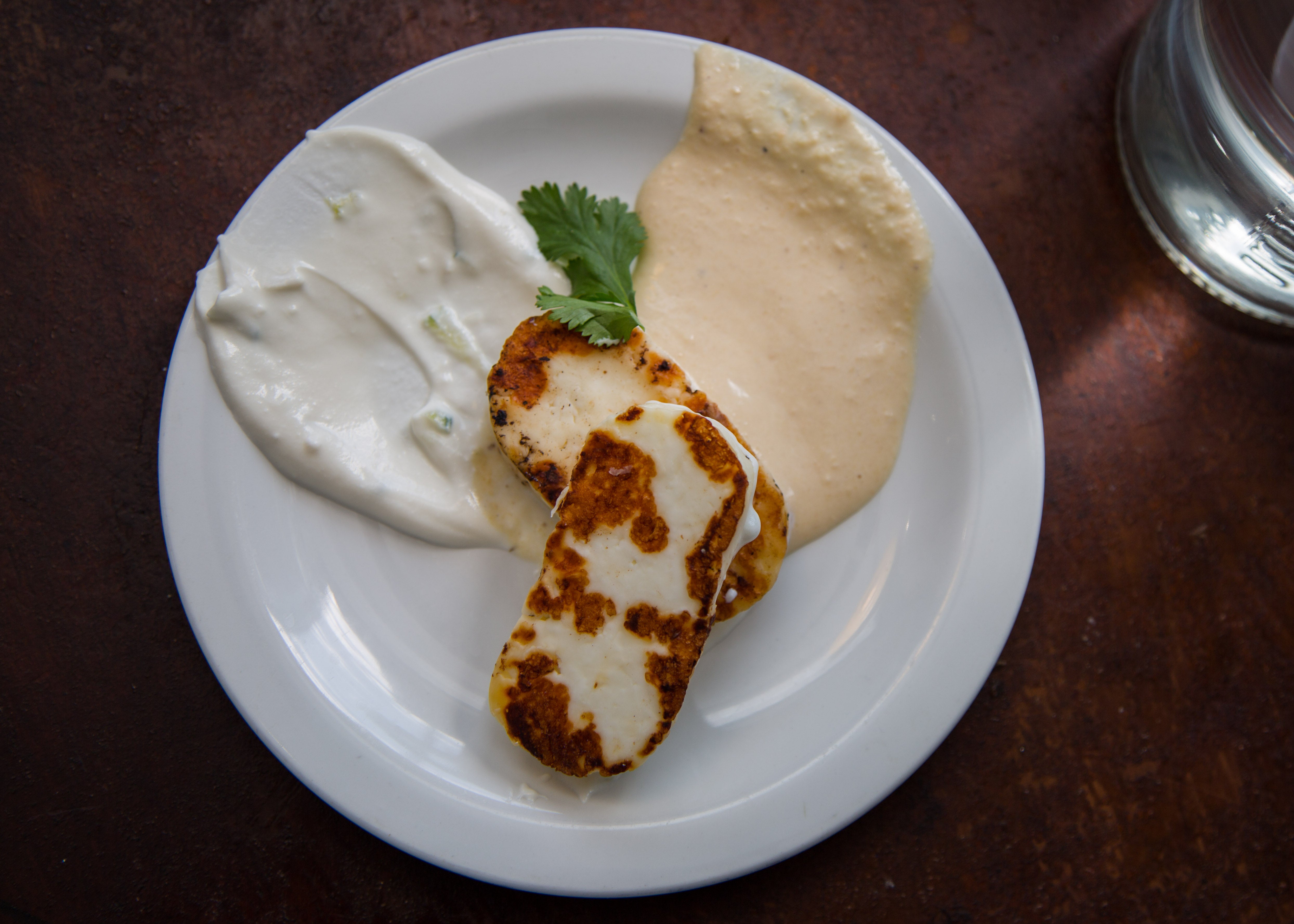 Grilled halloumi with house hummus and tzatziki