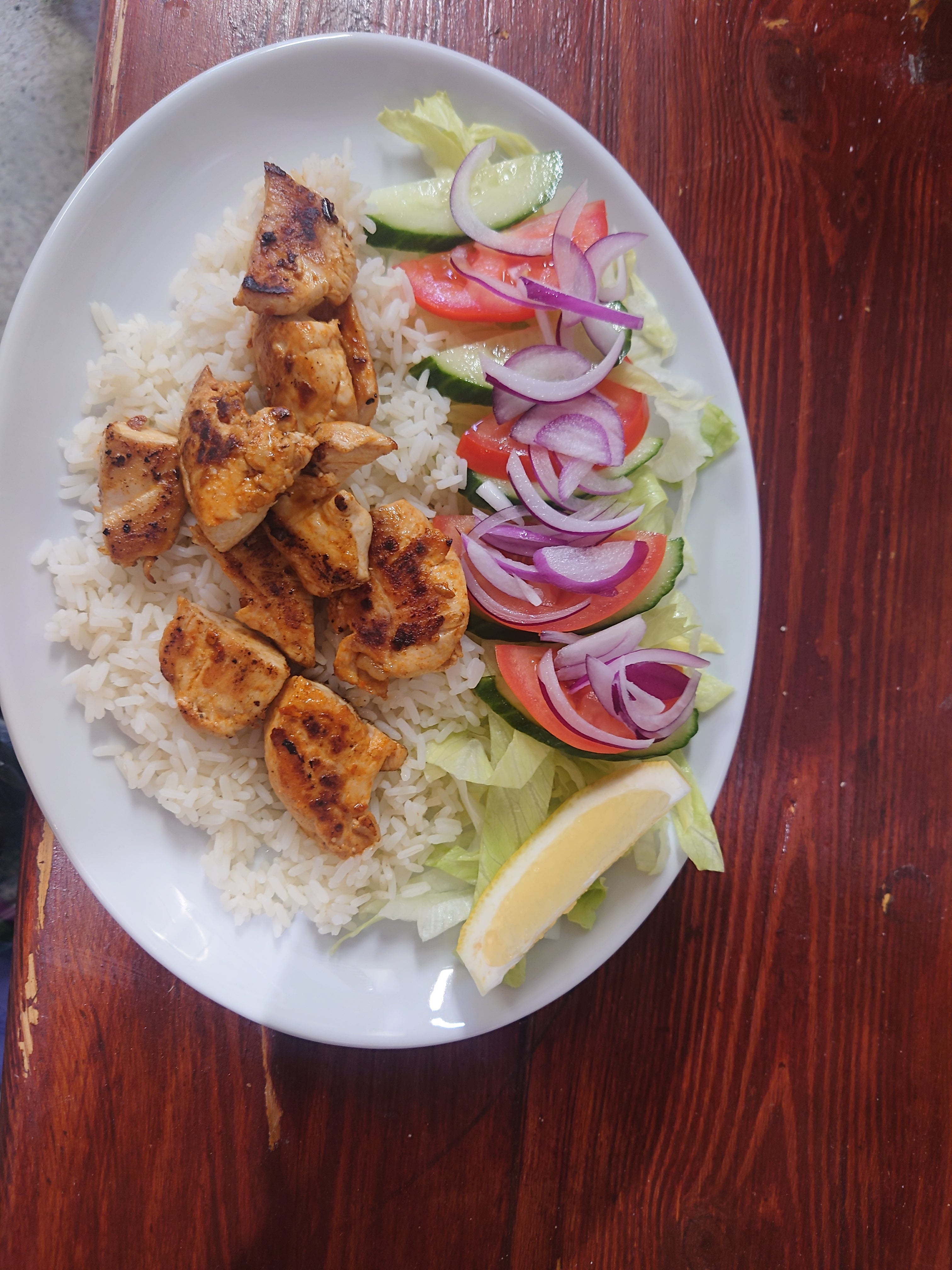 Chicken kebab rice and salad