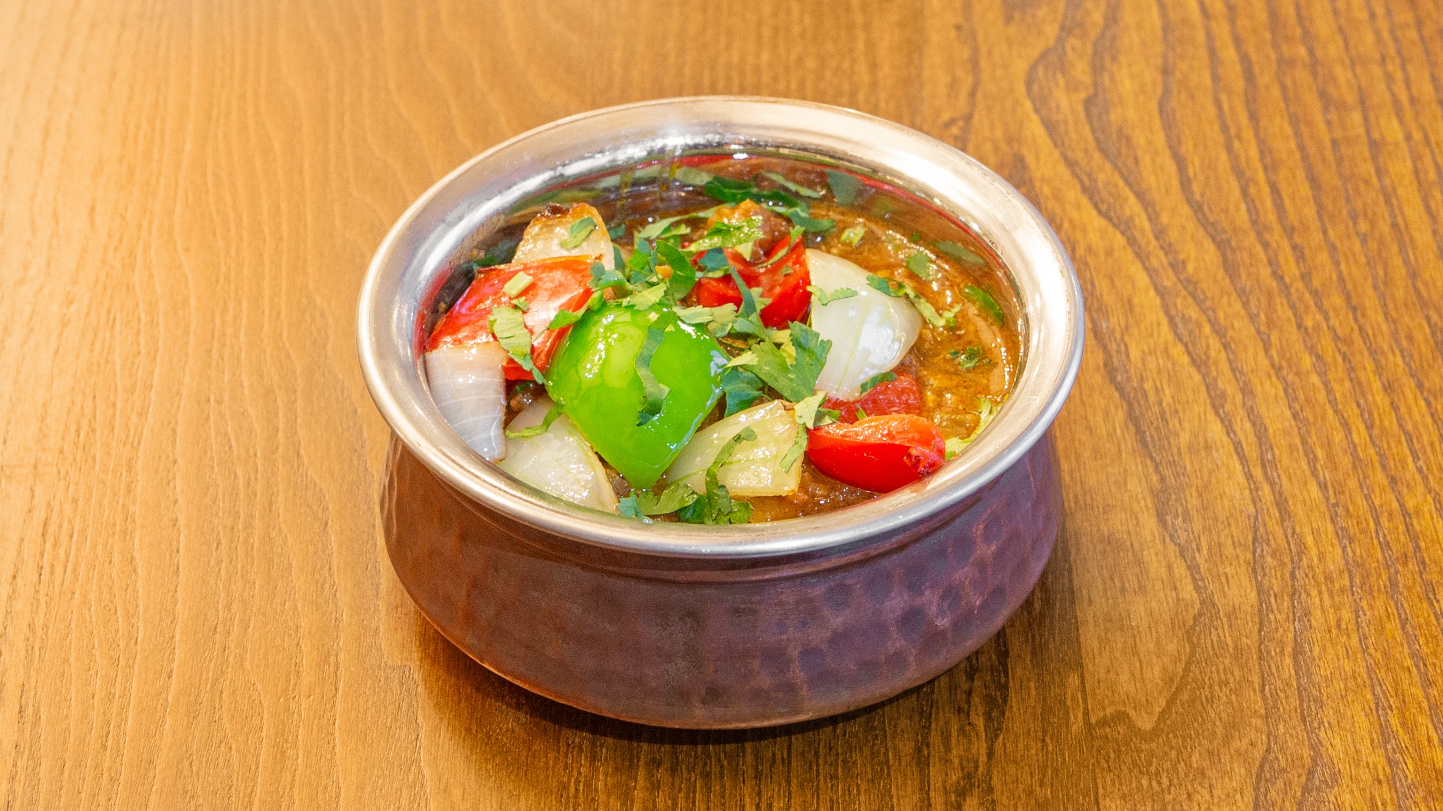 Chicken Balti, Karahi, Bhuna, Saag, Dhansak, Jalfrezi, Madras, Vindaloo, or Phaal