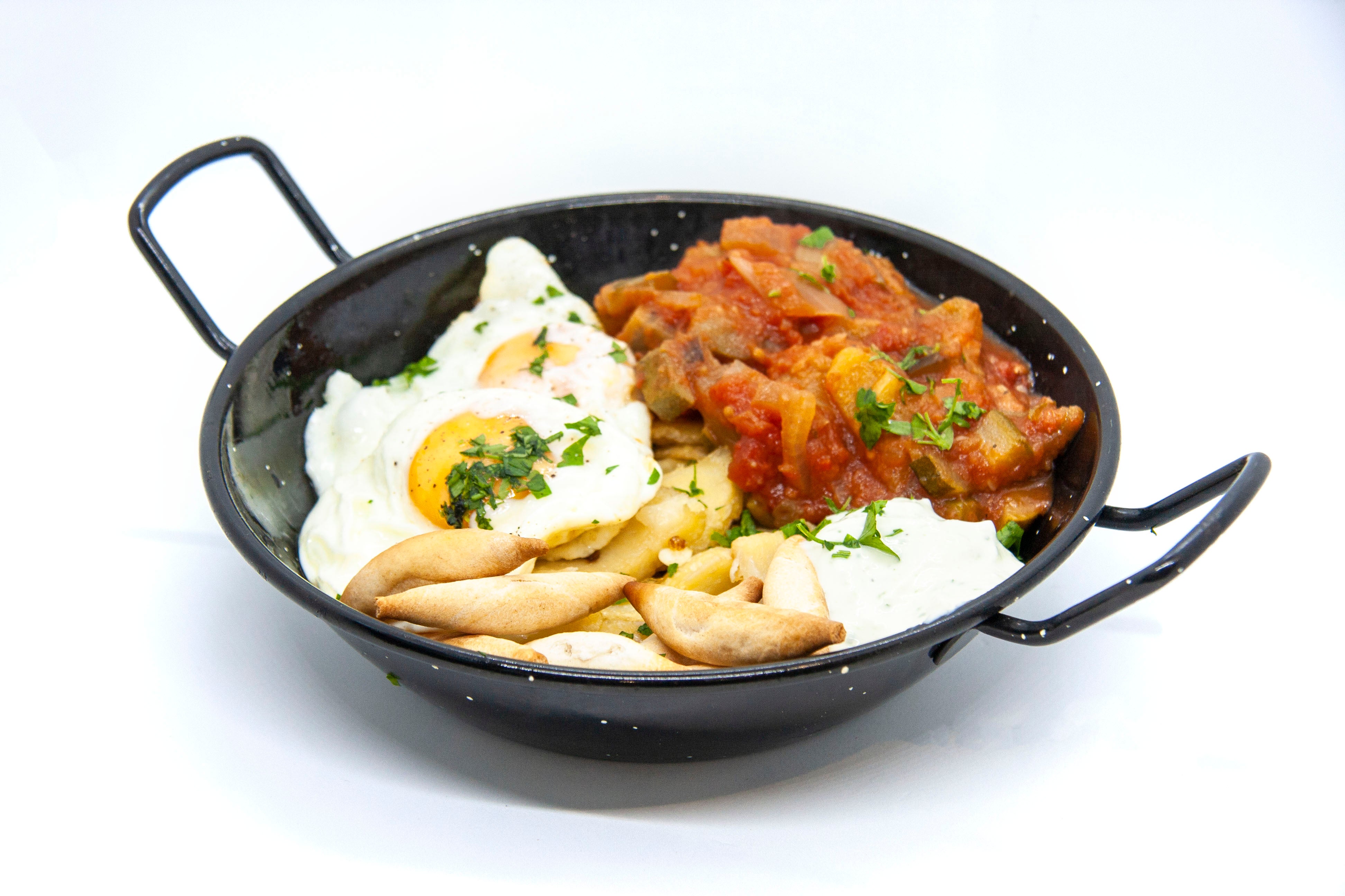 Huevos rotos with pisto manchego