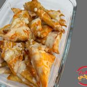 Vegetable Samosa With Tahini And Hot Sauce