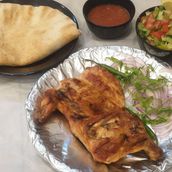 Half grilled chicken