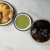 Profiterole With Pistachio Sauce and Cold Brew Coffee 