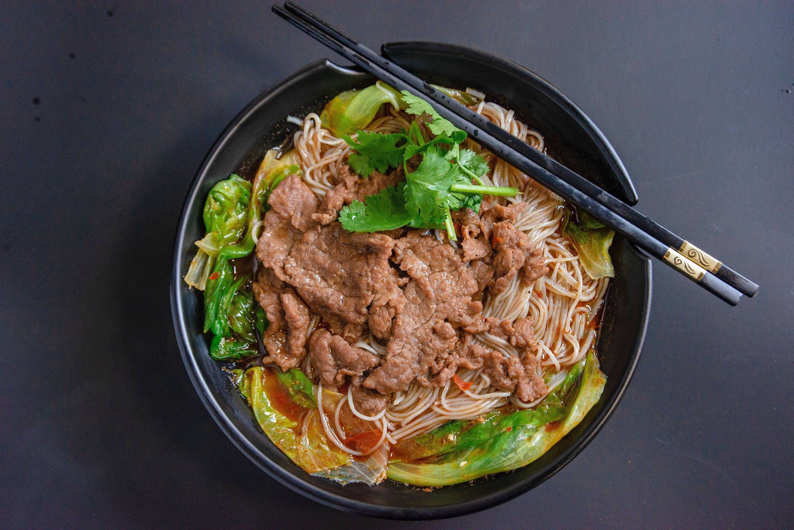 Spicy Beef Slices with Rice Noodles/ Udon 麻辣牛肉汤米线/乌冬