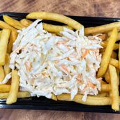 French Fries Served With Coleslaw Salad.