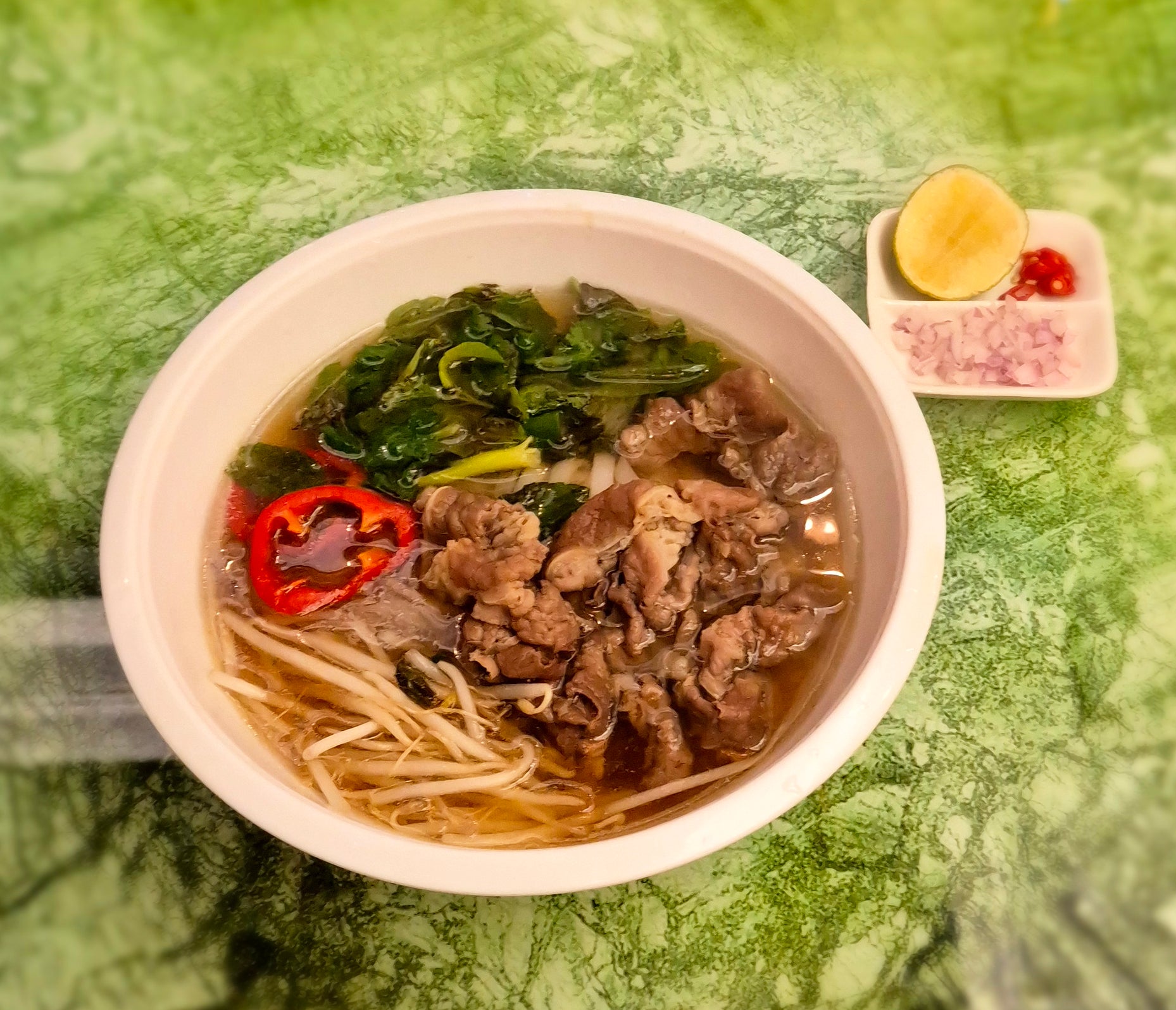 Spicy soup noodle with sliced pork