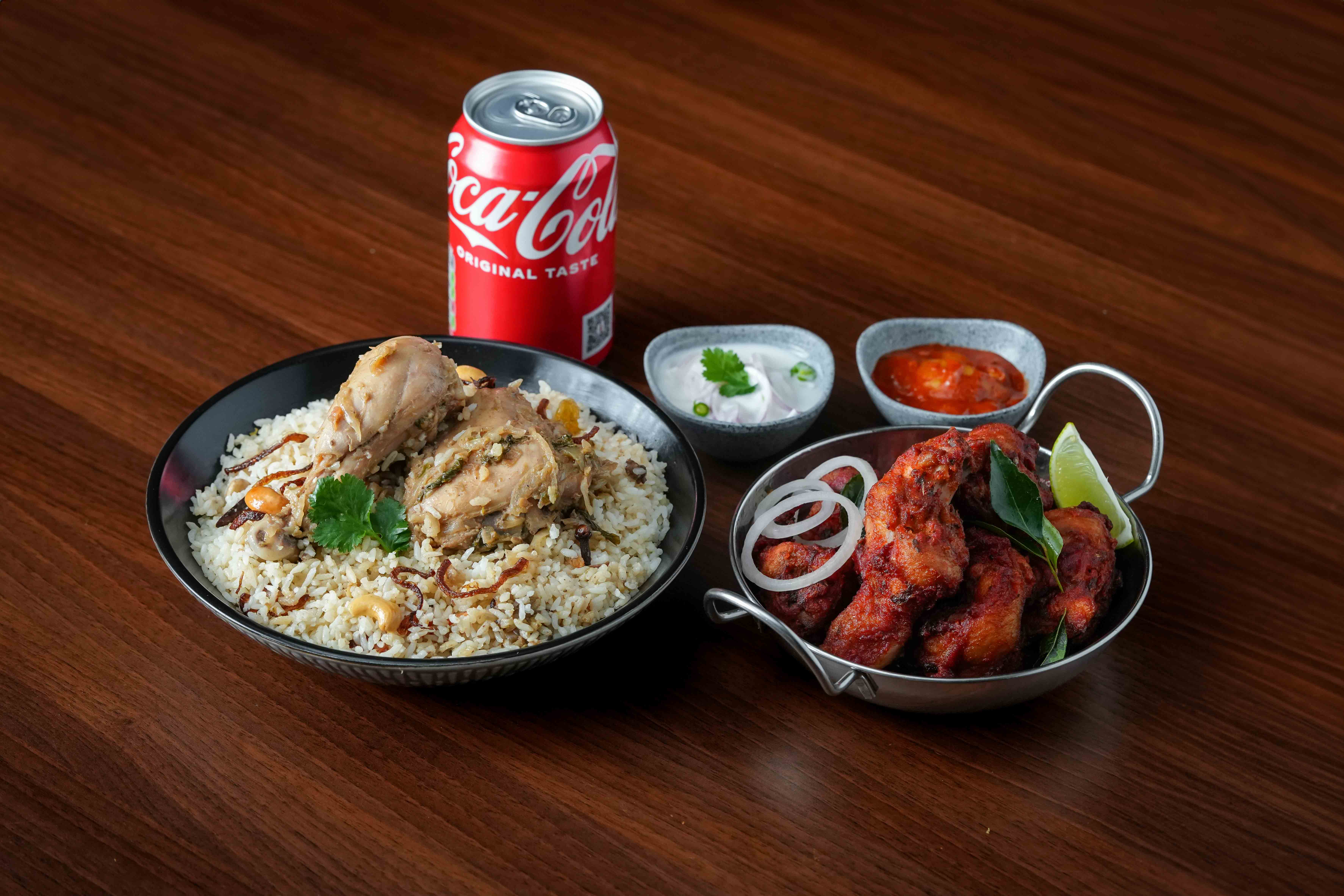 2 Chicken Dum Biriyani, Chicken Fry (5 Pieces) and 2 Drinks