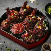 Black Pepper Chicken Lollipops