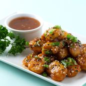 Sweet chicken strips with hot sauce