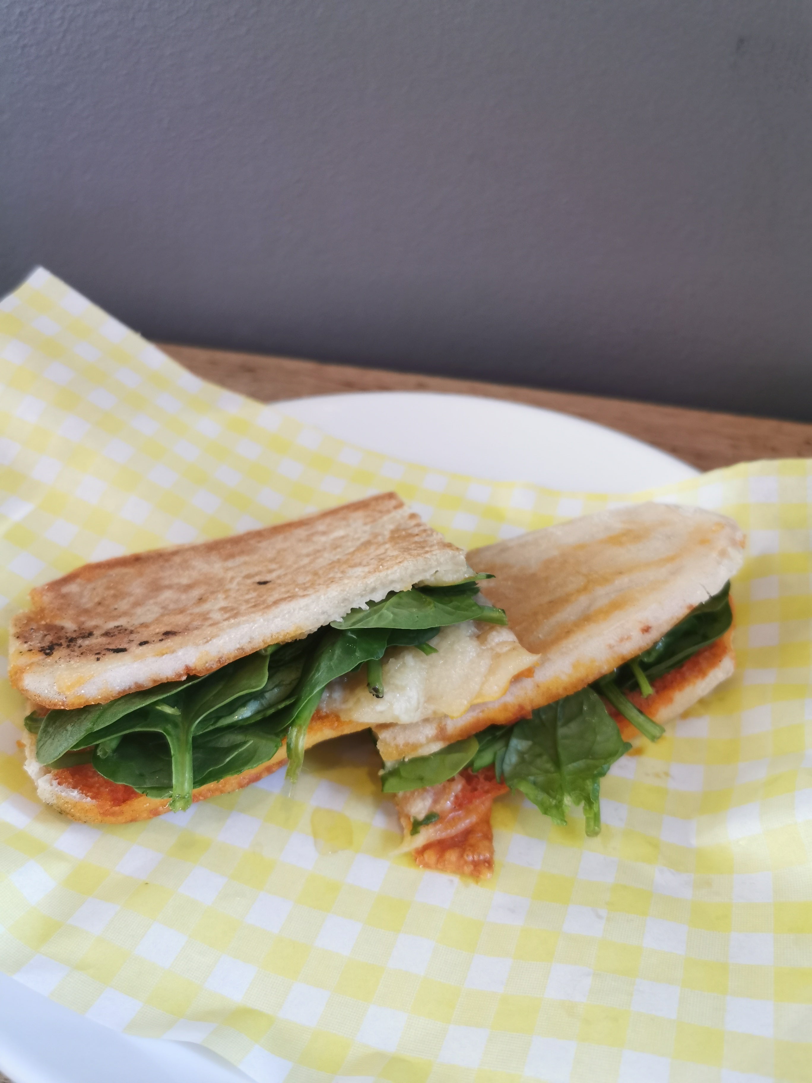 Sobrasada Spreadable Sausage, Manchego Cheese, Black Olive Paste, Honey & Spinach.