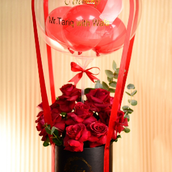 Red Flowers In Black Box With Transparent Balloon – Bold & Elegant