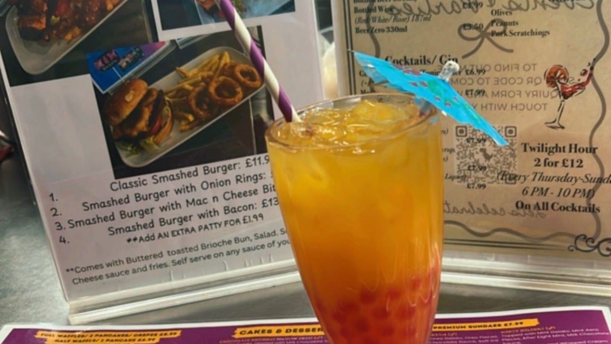 Mango Juice with Strawberry Bubbles