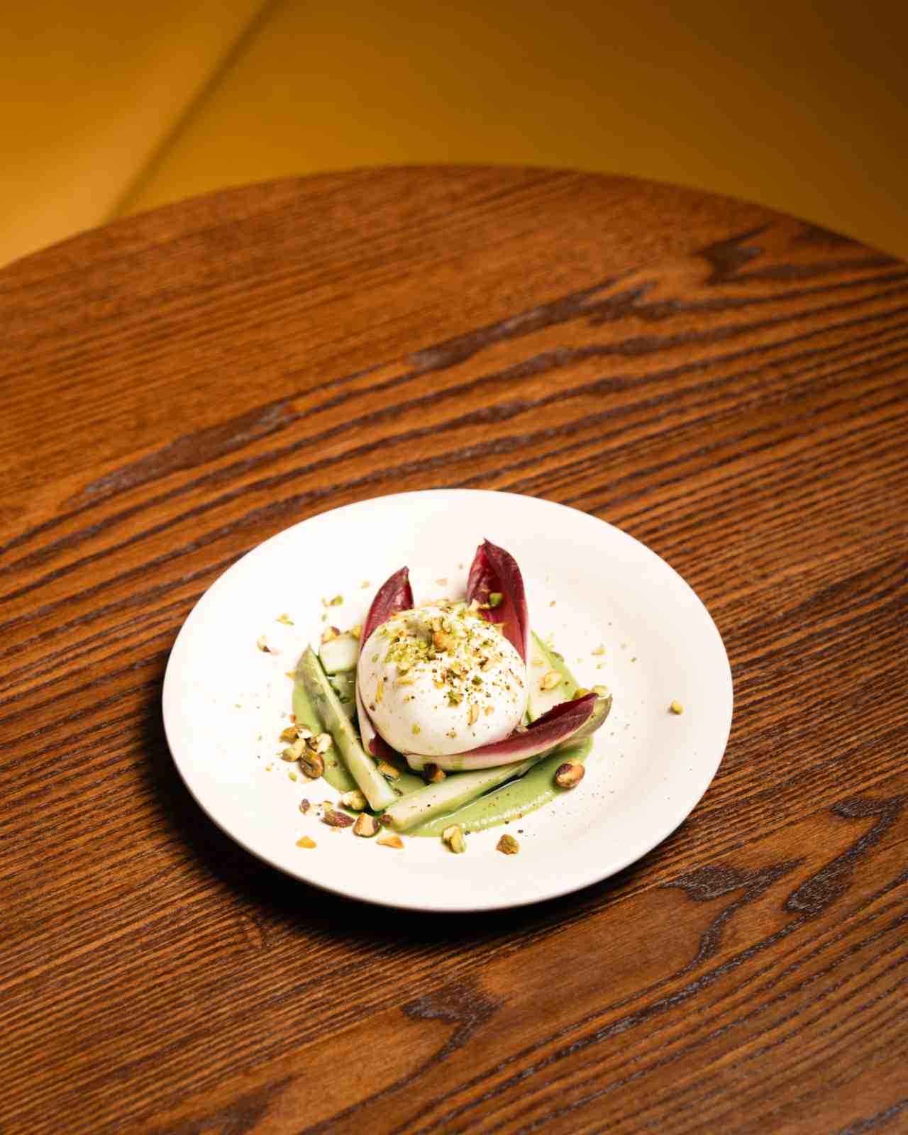 Artisan Burrata – Pea & Mint puree, Asparagus, red chicory, Hazelnut crumble