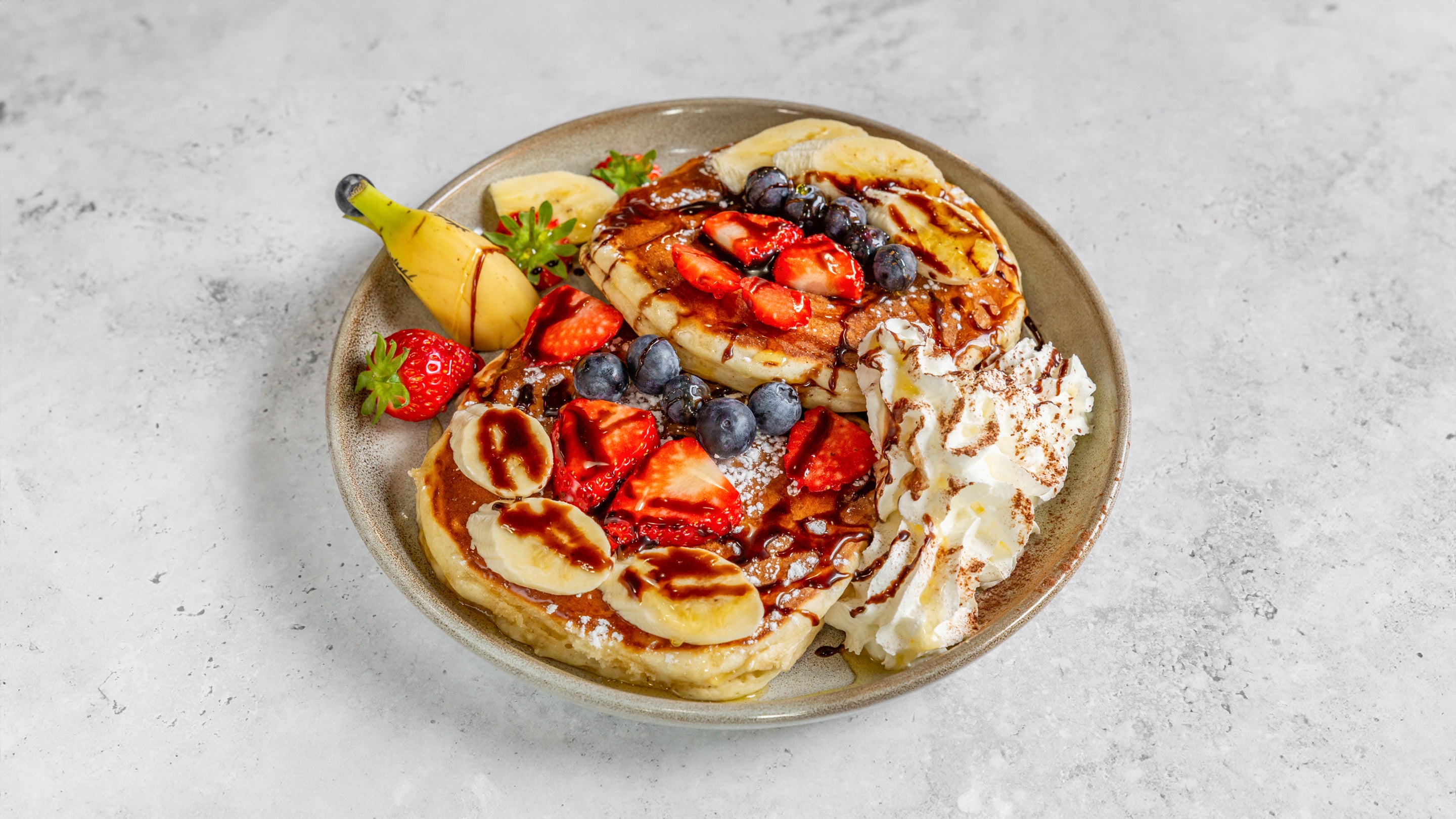 Pancake with Maple Syrup and Mixed Fruits