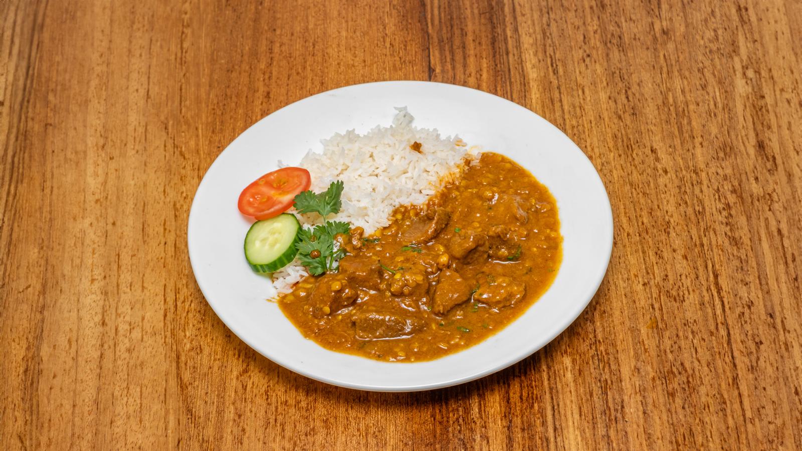 Lamb Dhansak With Rice And Salad