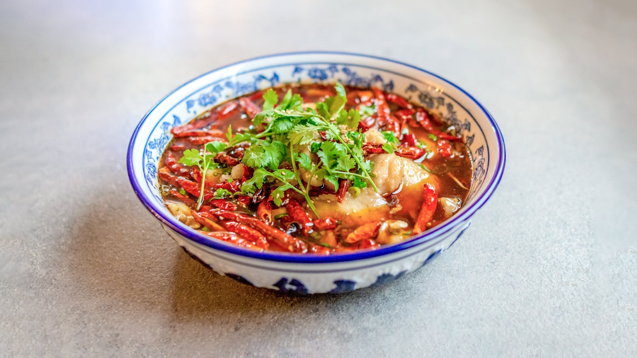 Special hot and spicy fish platter 麻辣鱼香锅