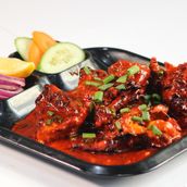Chicken Tandoori In Schezwan Gravy - Half