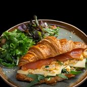 Scrambled eggs croissant with Salmon