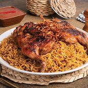 Gozi Diay on top of it rice