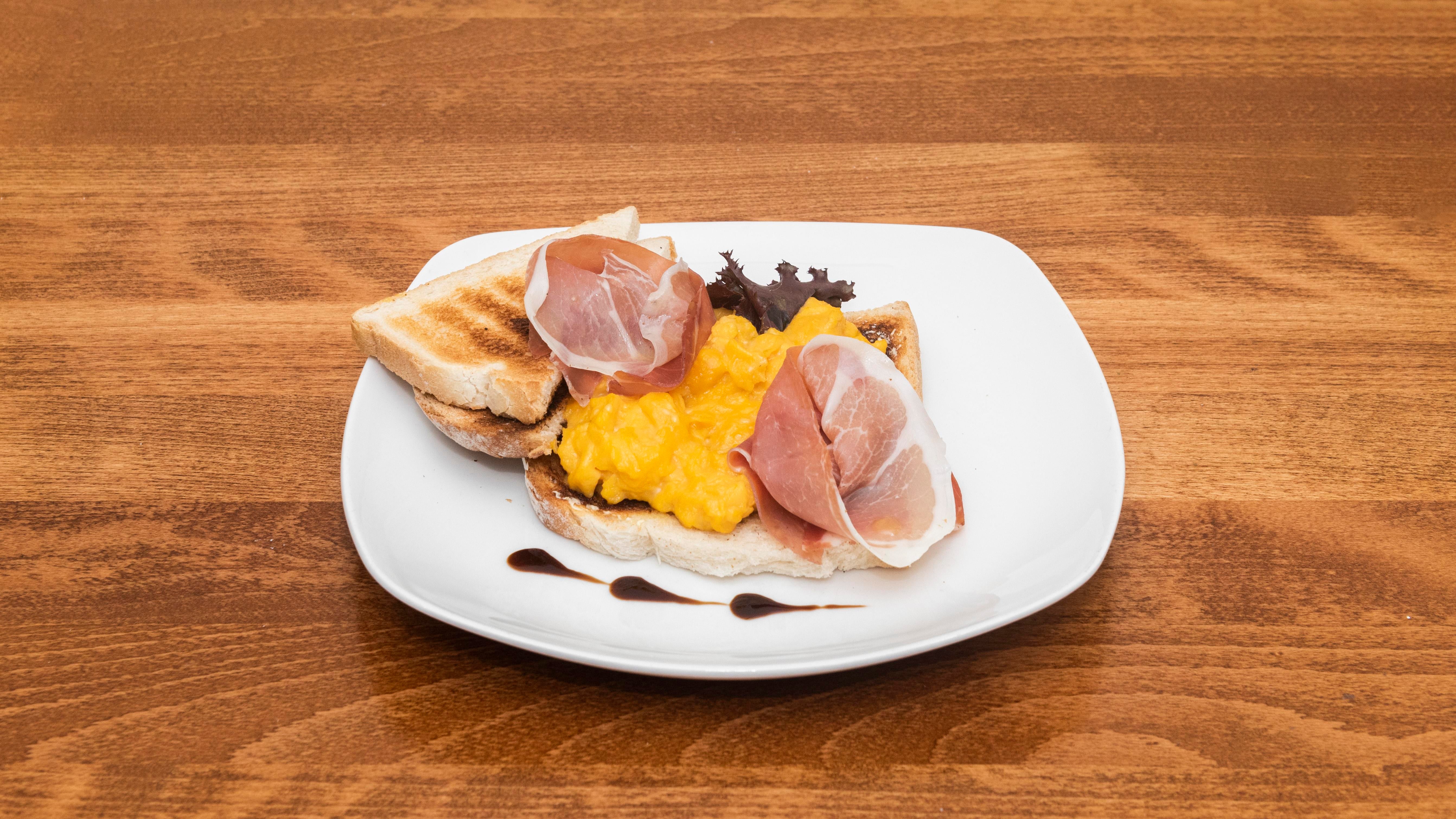 Parma Ham and Scrambled Eggs on Toast