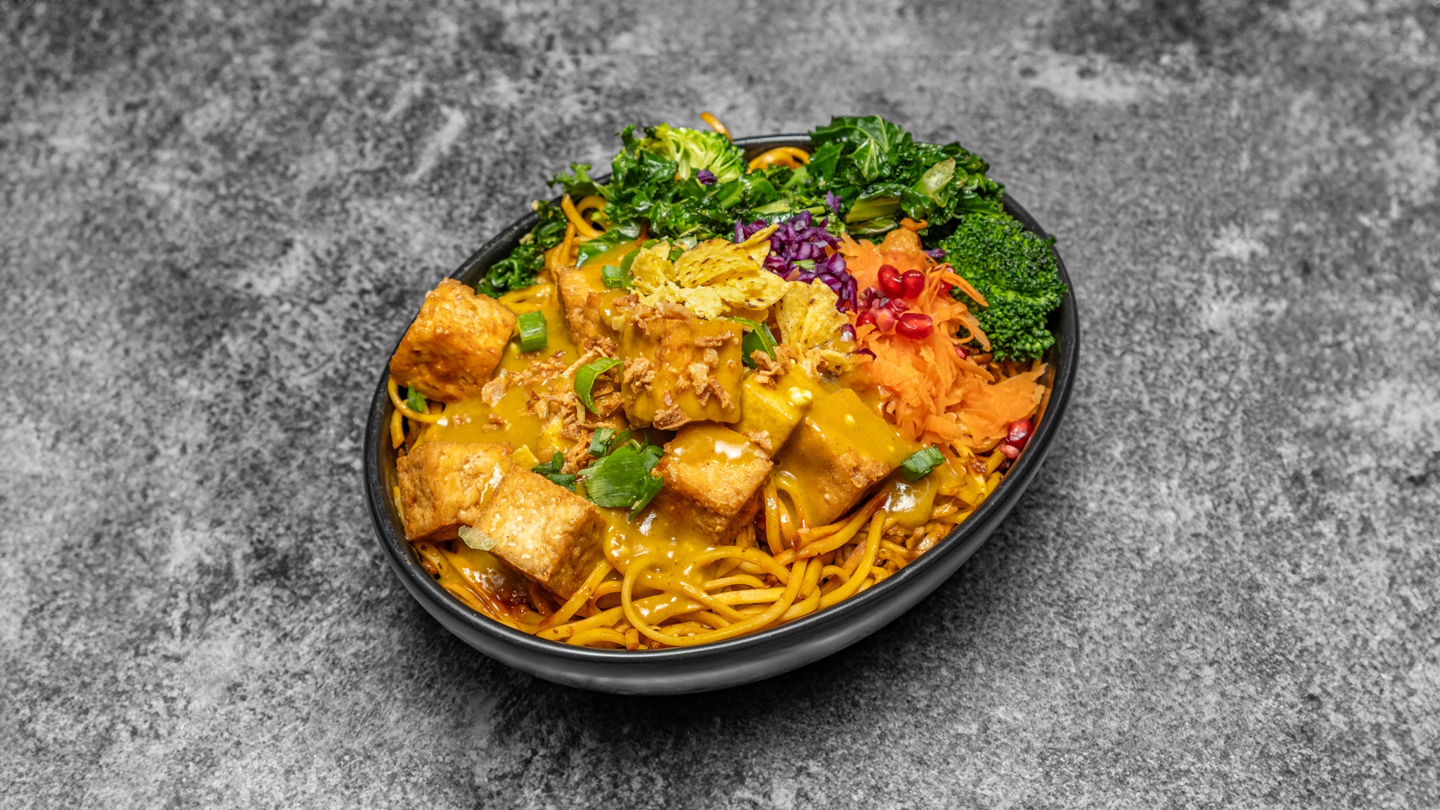 Crispy Hoisin tofu fried noodle with stir-fry vegetables