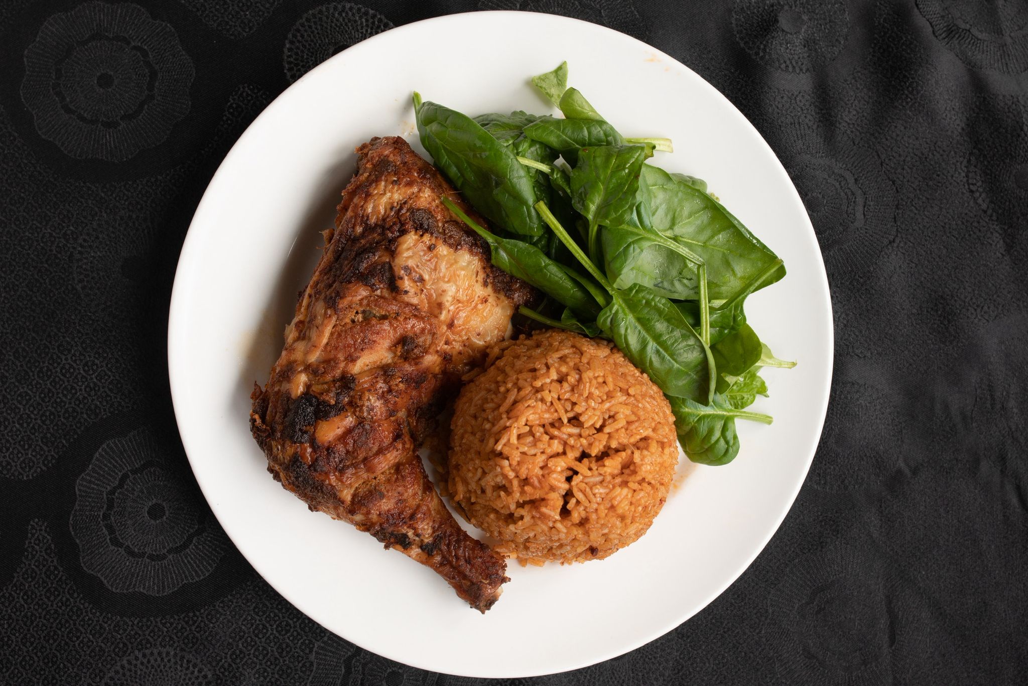 Grilled Mixed Herb Chicken with Jollof Rice and Spinach