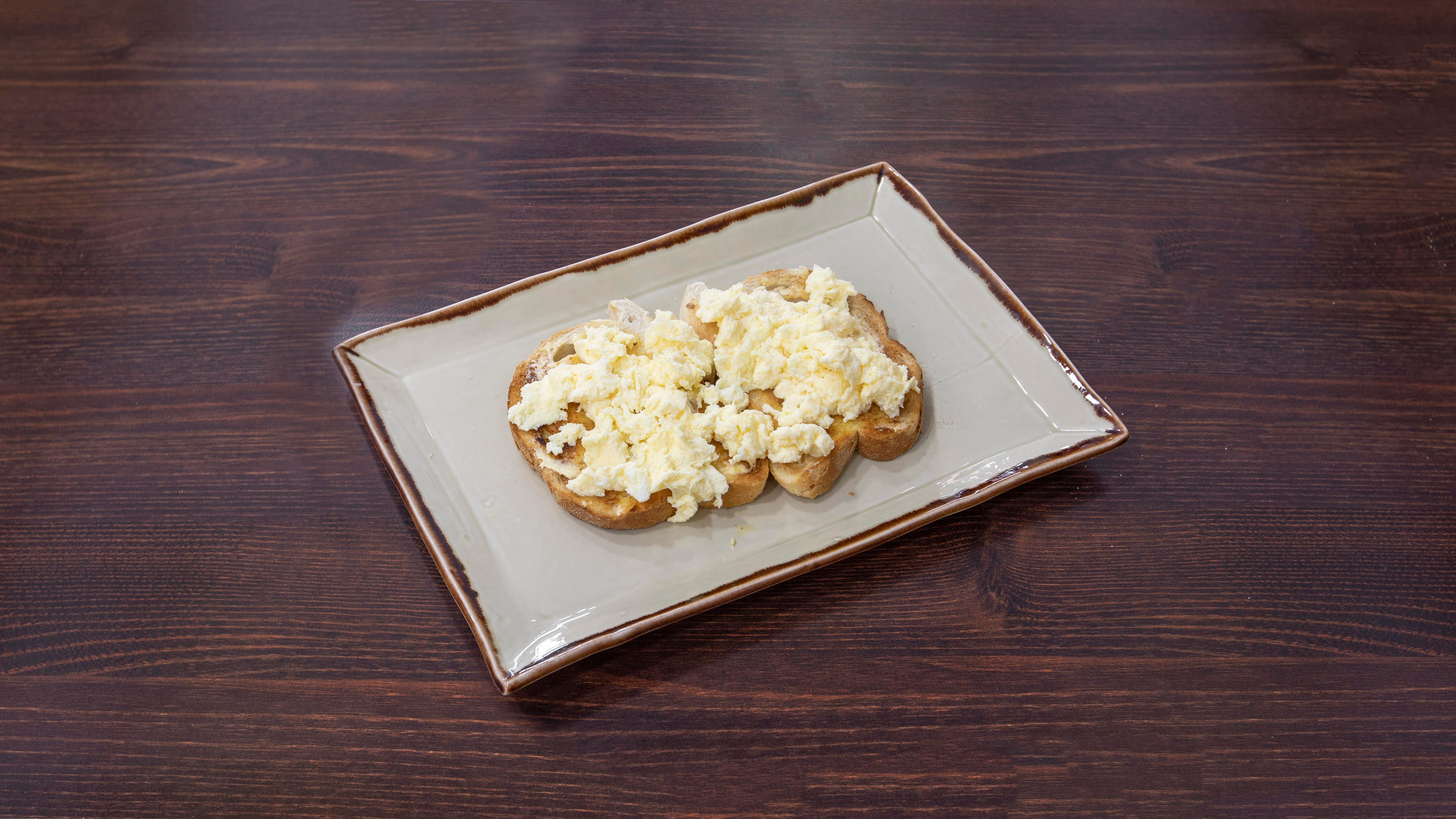 3 Scrambled Eggs on 2 Crusty White Toast