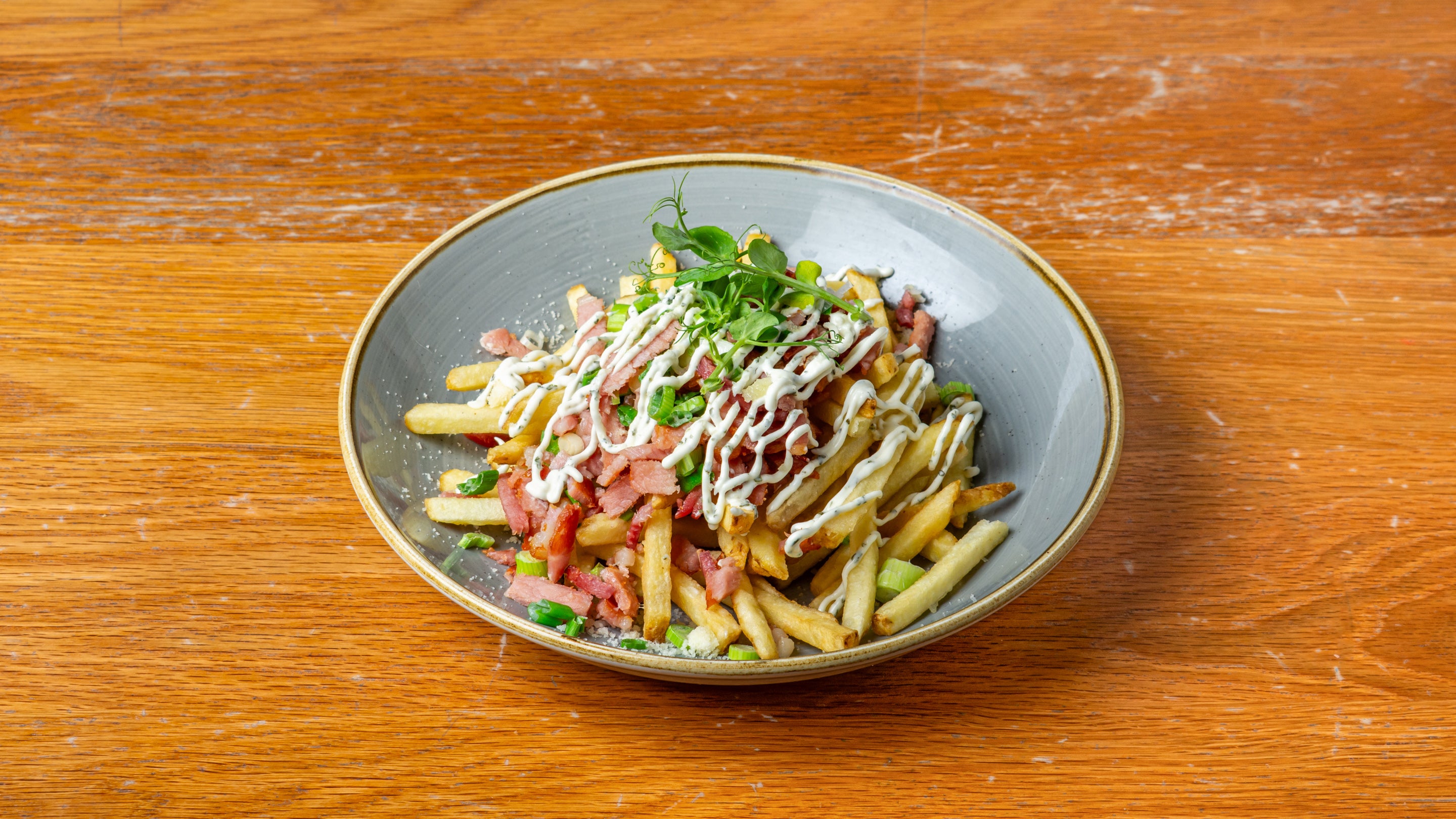 Crispy Bacon, Spring Onion & Parmesan Fries