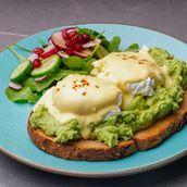 Avocado Toast With Poached Egg And Hollandaise Sauce