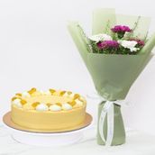 4-Serving Mango Cake with Purple and White Carnations