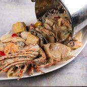 Fish Bucket (Shrimp, Crab, Squid, Mussels, Calamari, Corn, Lobster, Broccoli)