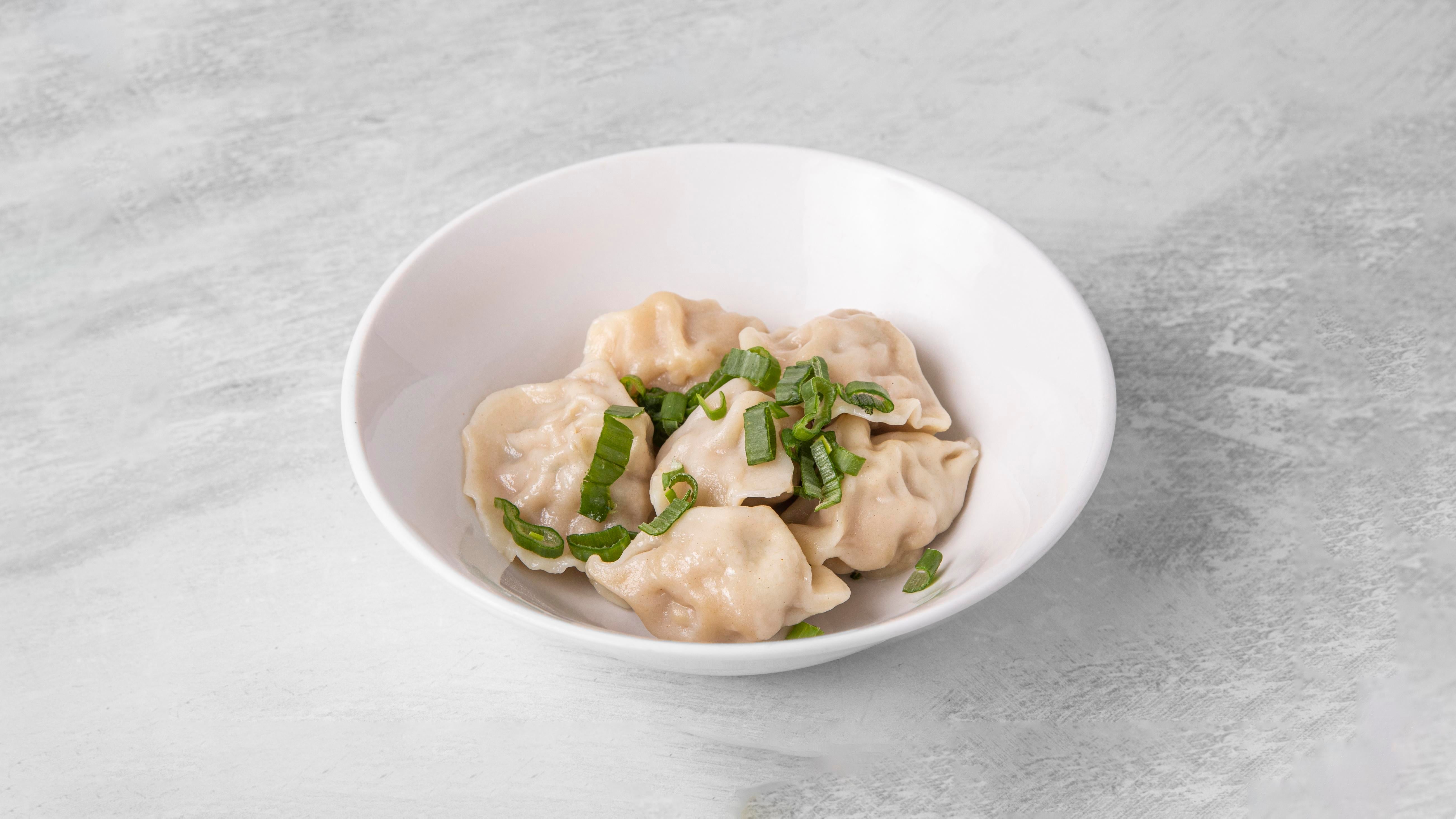 Steamed Hand Made Pork Dumpling