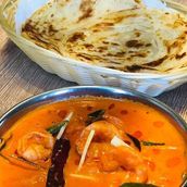 Poratta With Fish Curry
