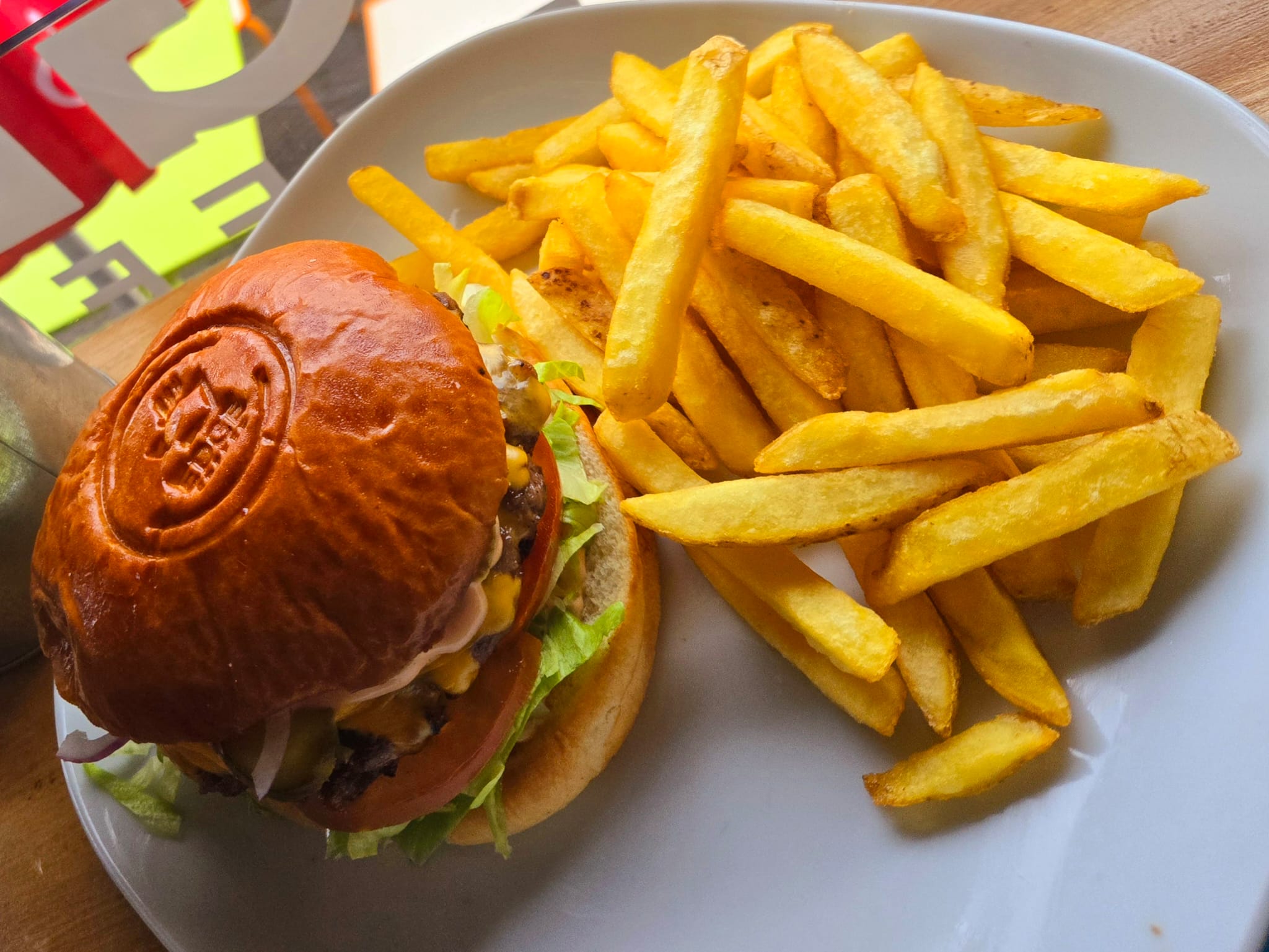 Grill chicken burger served with fries