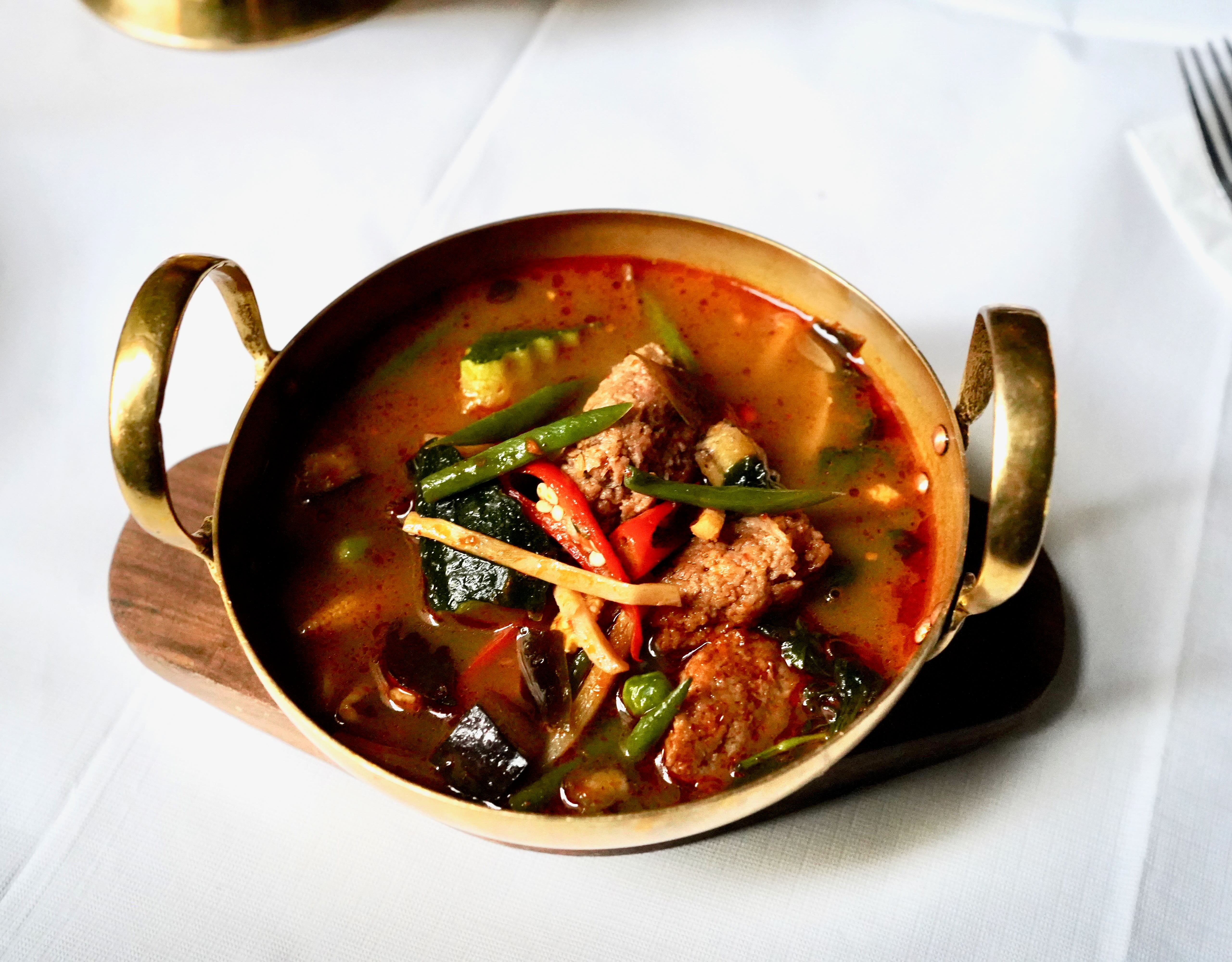 Red clear curry with vegan mince & abundance of Thai fresh herbs