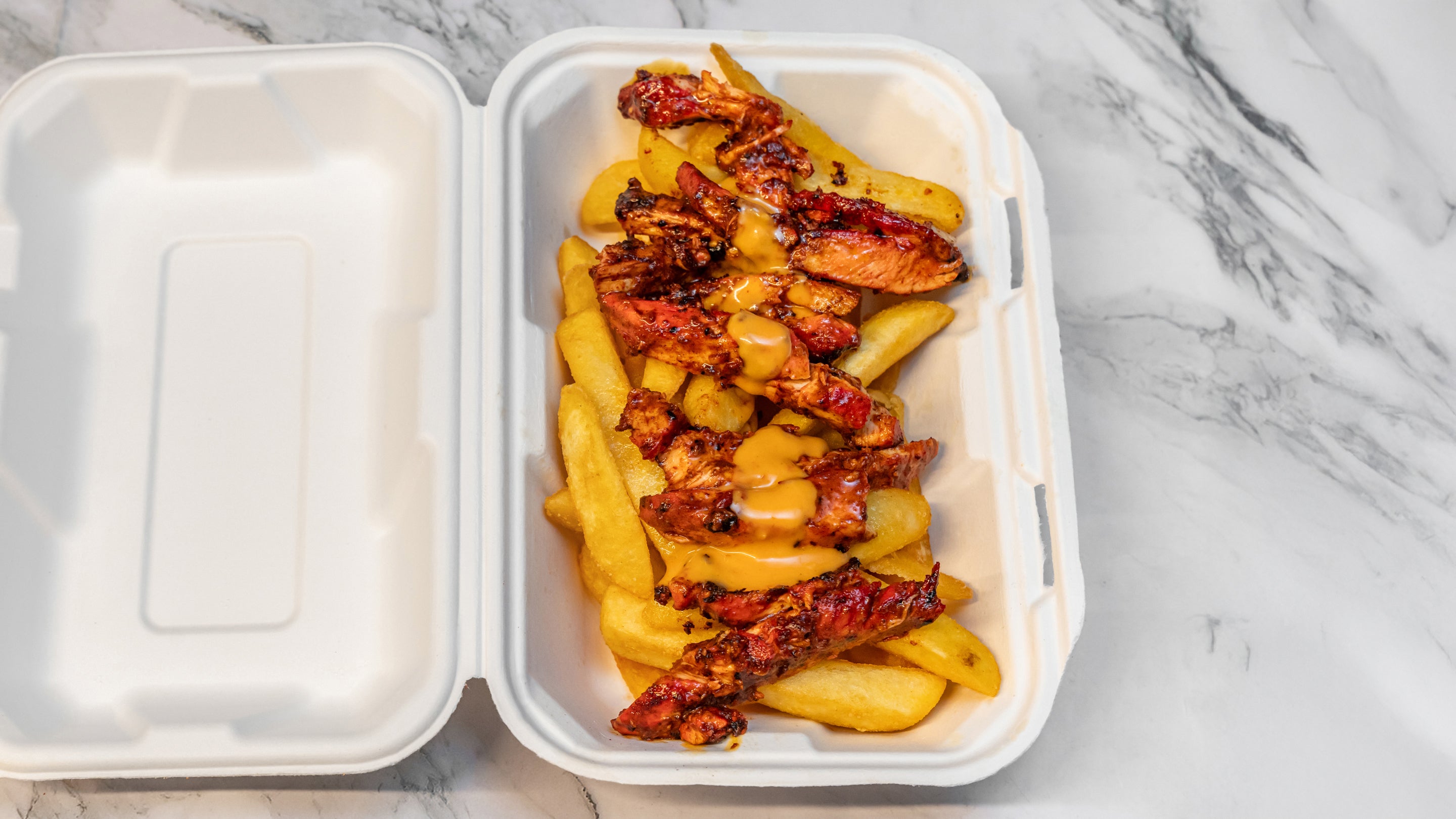 Peri-Peri Chicken Steak on Fries