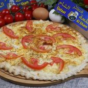 Eggs With Tomato Manakish
