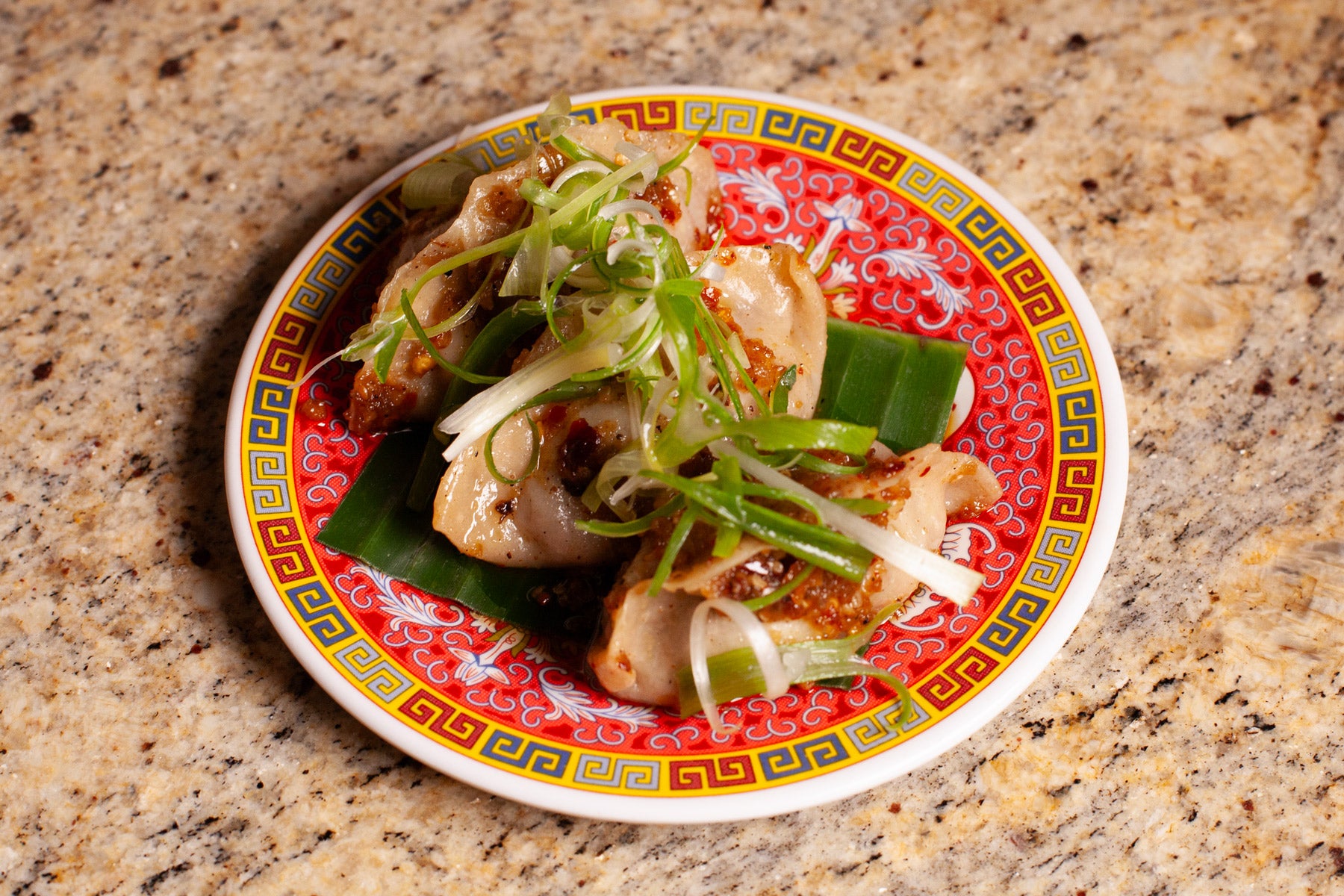 Smokey jackfruit dumplings w/ Mala sauce