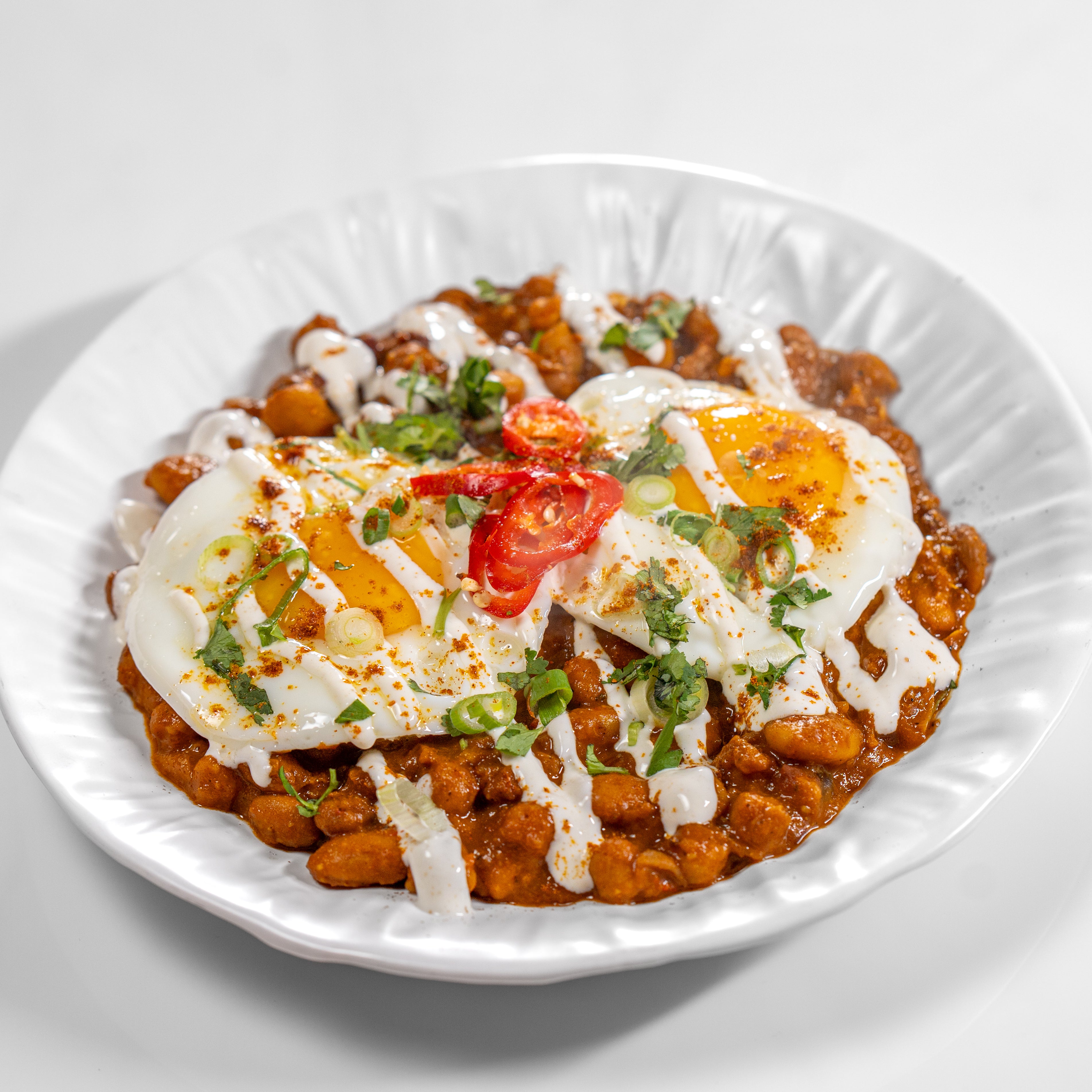 Baked Eggs with Masala Beans