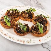 Caramelized Tomato and Olive Caprese Bruschetta
