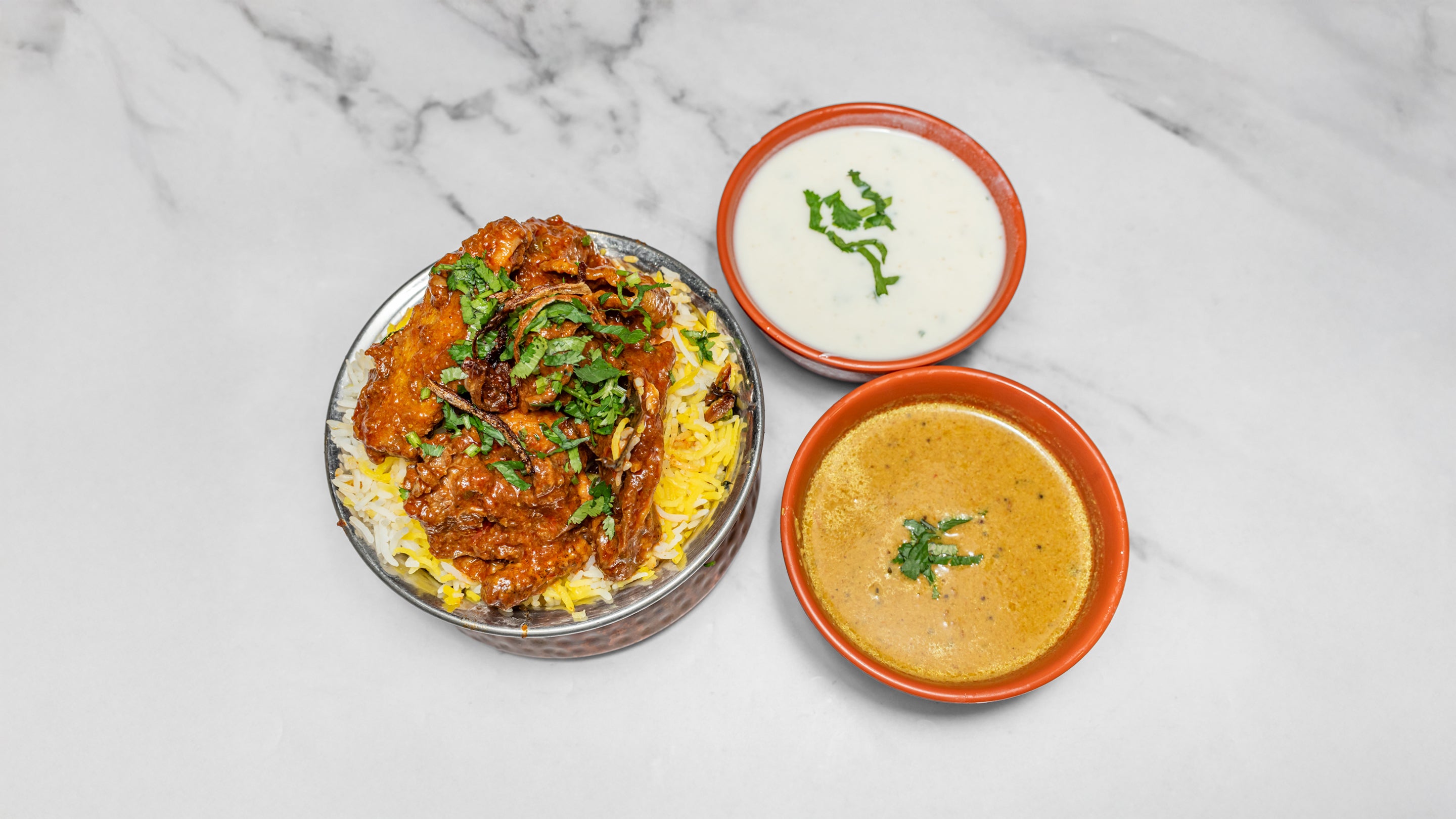 Natukodi gongoora biryani