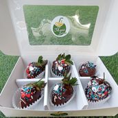 6 fresh strawberries dipped in delicious chocolate with a layer of colorful sweets