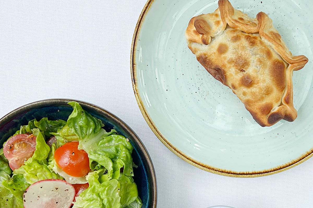 One empanada with salad