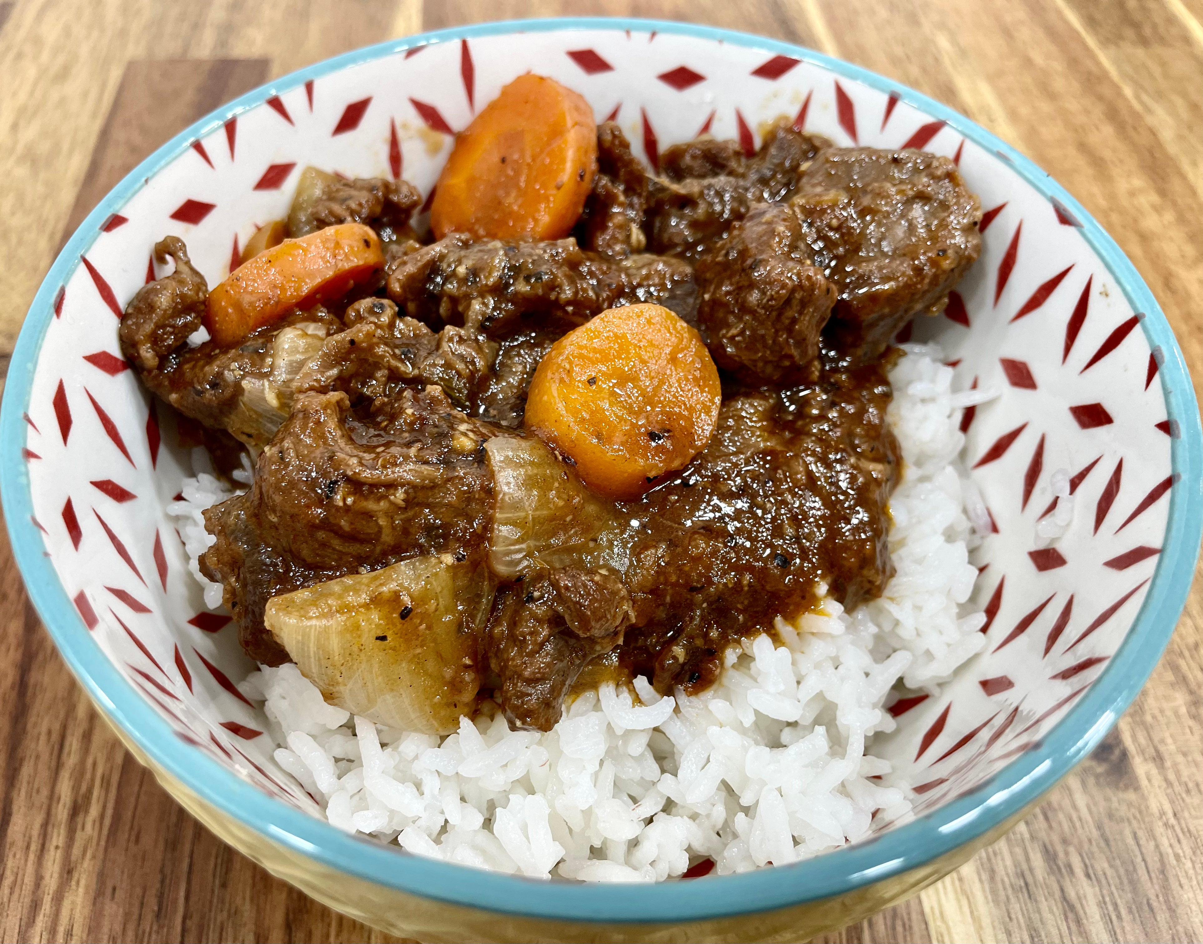 Braised Beef in Black Pepper Sauce(served with Rice & Soy Braised Egg )黑胡椒牛肉飯