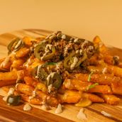 French Fries With Cheese And Chili Minced Meat Sauce
